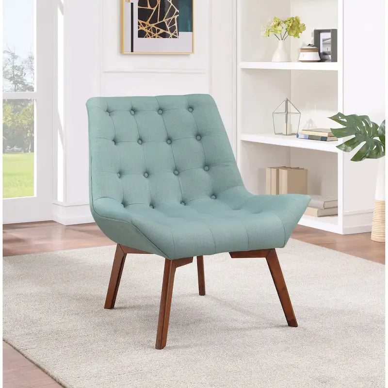 Sillón capitoné con patas de color café