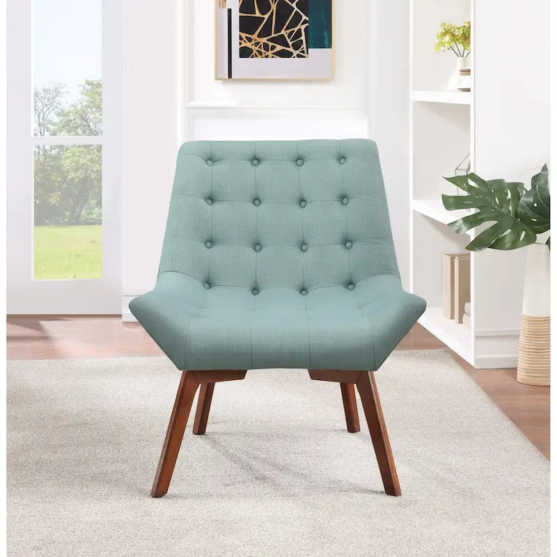 Sillón capitoné con patas de color café
