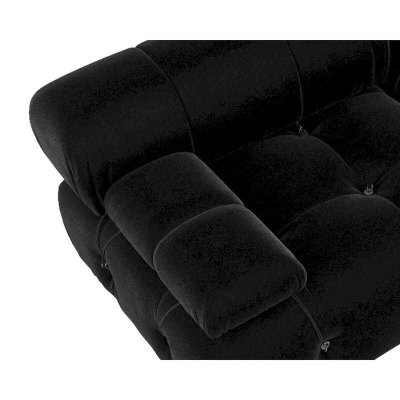 Sofá seccional tapizado en terciopelo negro