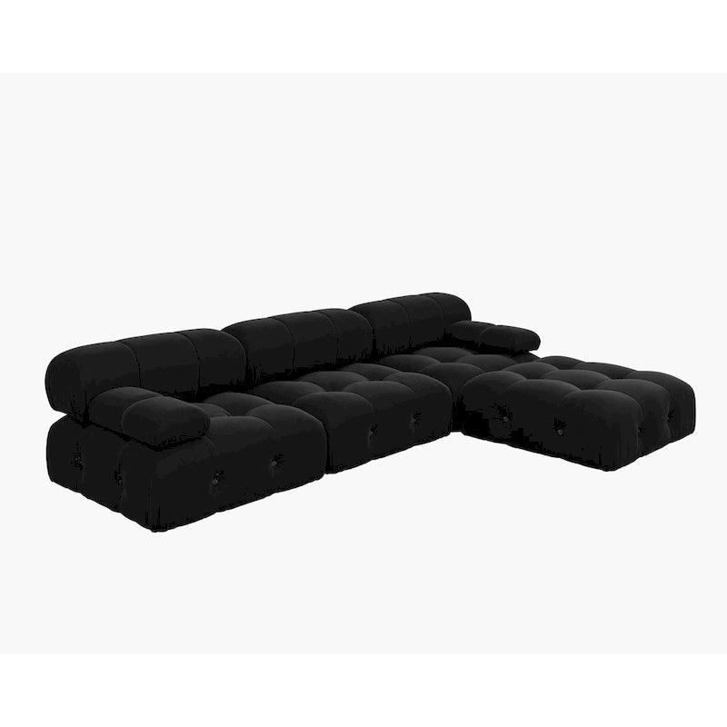 Sofá seccional tapizado en terciopelo negro