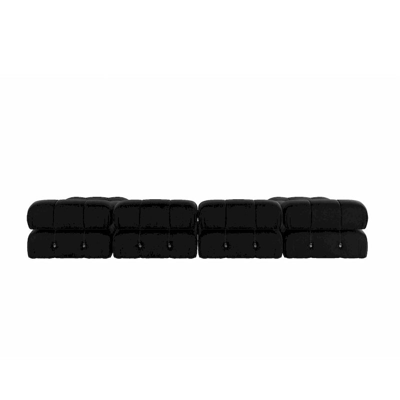 Sofá seccional tapizado en terciopelo negro