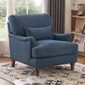 Sillón tapizado con cojín lumbar, estructura de madera maciza