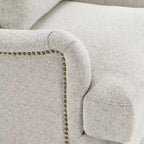 Sillón tapizado con cojín lumbar, estructura de madera maciza
