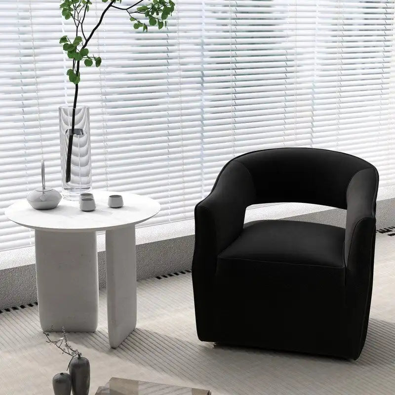 Sillón giratorio decorativo de terciopelo con respaldo abierto y base metálica
