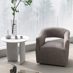 Sillón giratorio decorativo de terciopelo con respaldo abierto y base metálica