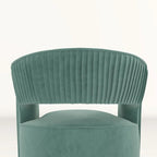 Sillón giratorio decorativo de terciopelo con respaldo abierto y base metálica