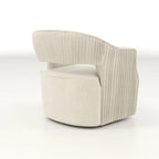 Sillón giratorio decorativo de terciopelo con respaldo abierto y base metálica