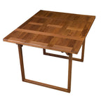 Mesa de teca con rompecabezas