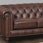 Sofá Chesterfield de cuero flor con capitoné de rombos
