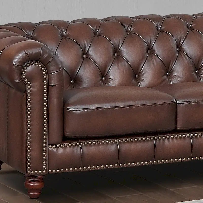 Sofá Chesterfield de cuero flor con capitoné de rombos